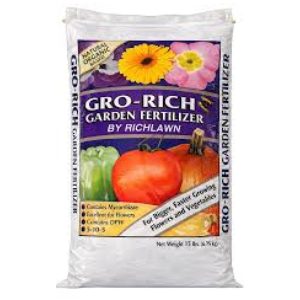 Bag of Gro-Rich Garden Fertilizer (Richlawn) with images of a sunflower, pink flower, tomato, and peppers