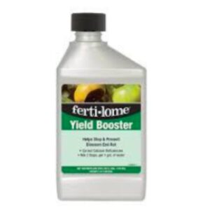 Ferti-lome Yield Booster garden product bottle with green label and black cap, used for boosting plant yield on label art shows fruit image.