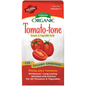 Espoma Organic Tomato & Vegetable Food bag featuring red top panel, green logo, and ripe tomatoes on white background for organic gardening use